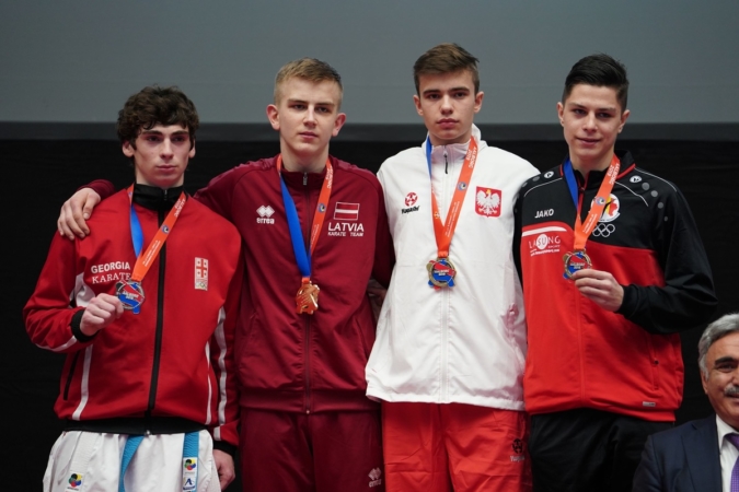 JERMOLAEV ARTJOM (LATVIA), MANIA SABA (GEORGIA), ANISIMOV DANYIL (BELGIUM), JAROCKI HUBERT (POLAND) in Cadet Kumite Male Ð 70 Kg - podium JERMOLAEV ARTJOM (LATVIA), MANIA SABA (GEORGIA), ANISIMOV DANYIL (BELGIUM), JAROCKI HUBERT (POLAND) in Cadet Kumite Male Ð 70 Kg - podium
Photo taken during European Championship Aalborg 2019 in (Gigantium) on 08/02/2019. Event organized by World Karate Federation.
©2019 Xavier Servolle / Kphotos